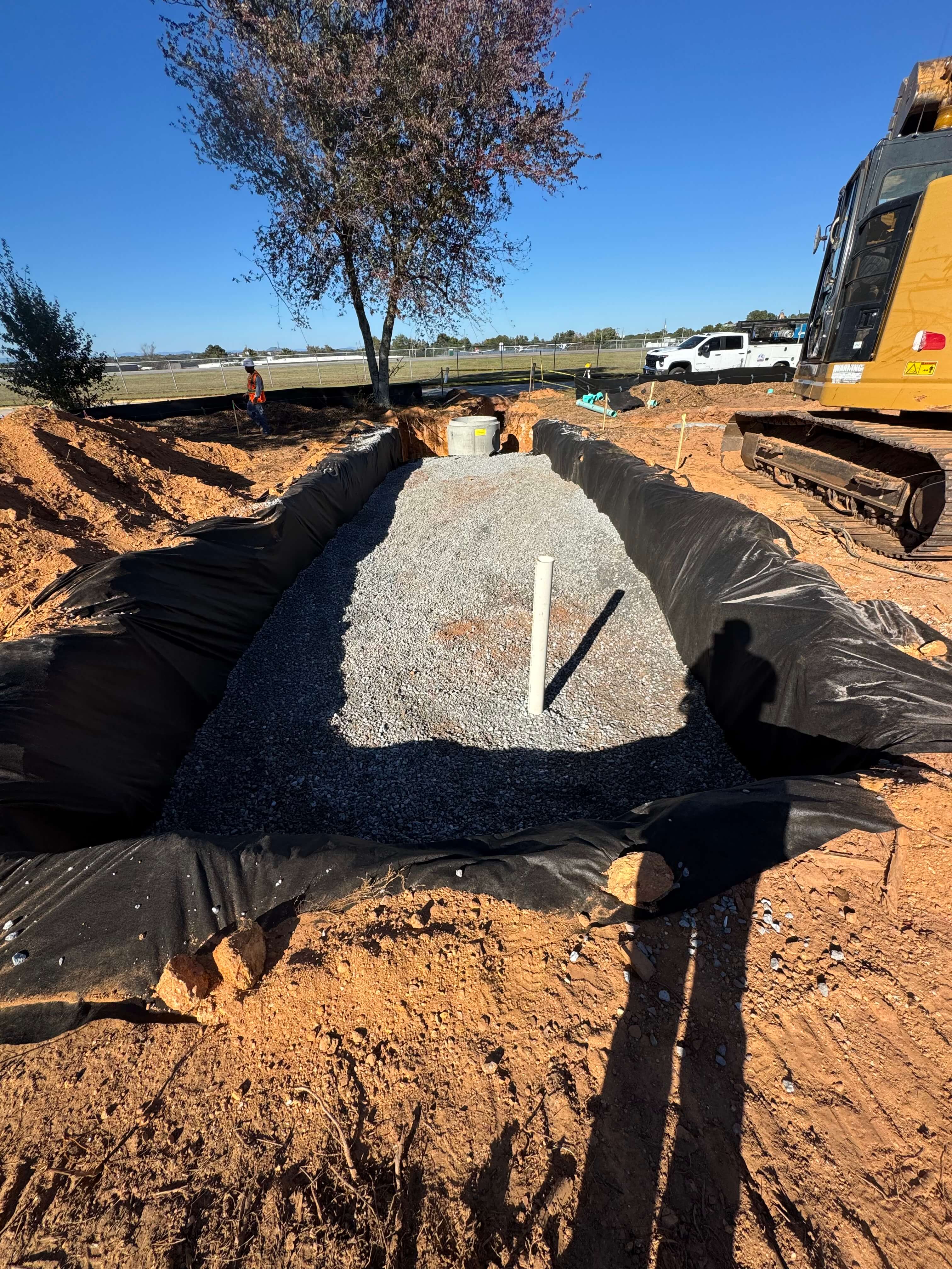Completed stormwater drain pipe installation for civil construction in Hall County, Northeast Georgia