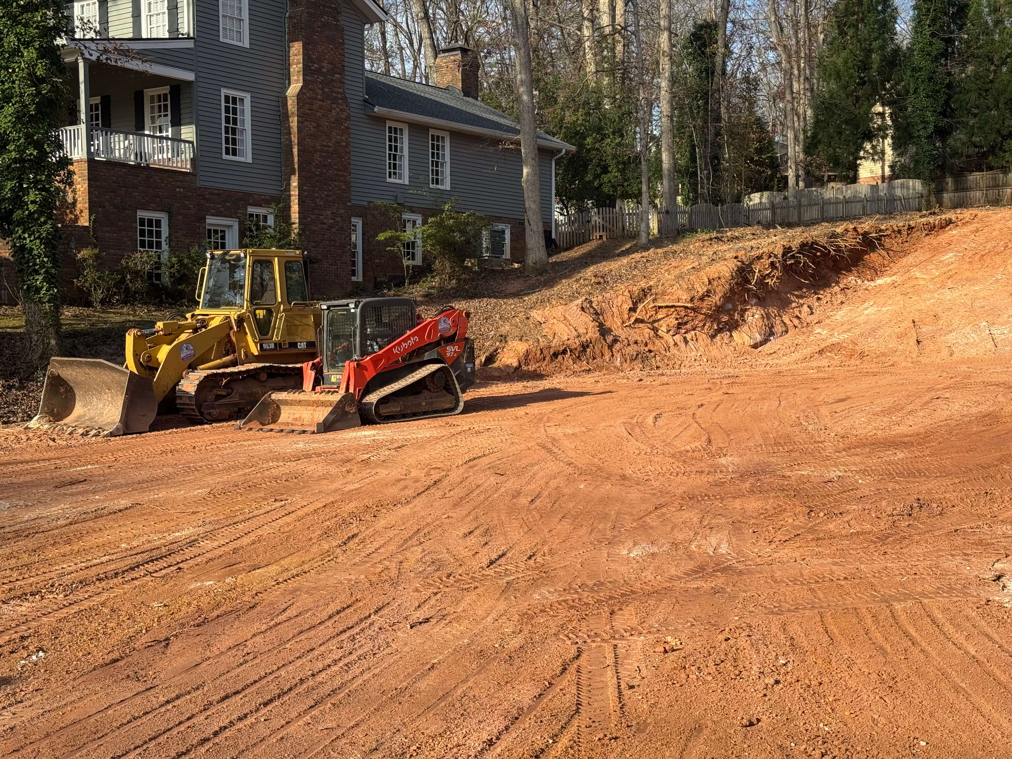 Bobcat performing residential grading and lot preparation in Oakwood, Hall County, Georgia